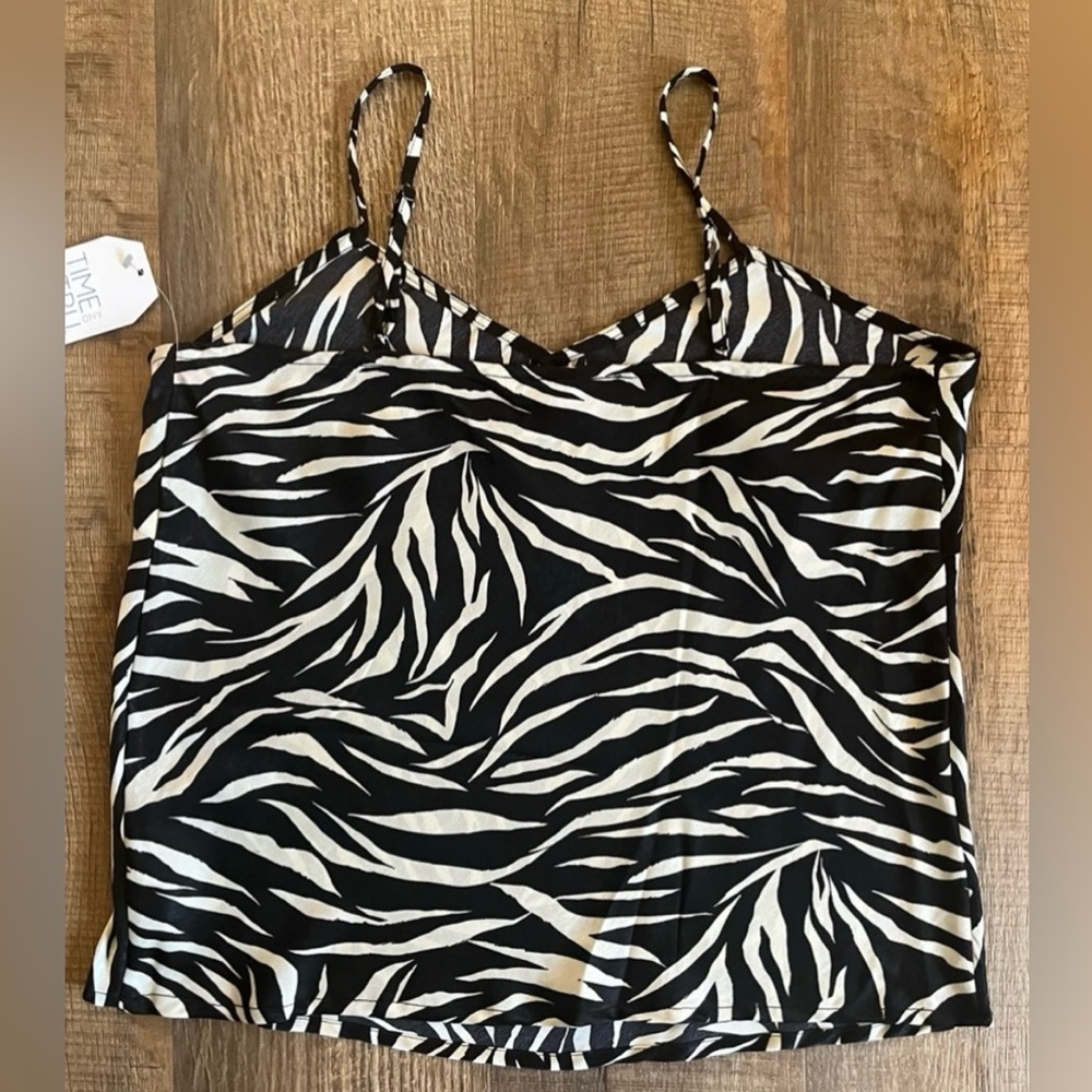 Zebra print camisole. Features adjustable straps. New with tags. Size Small - Picture 4 of 7